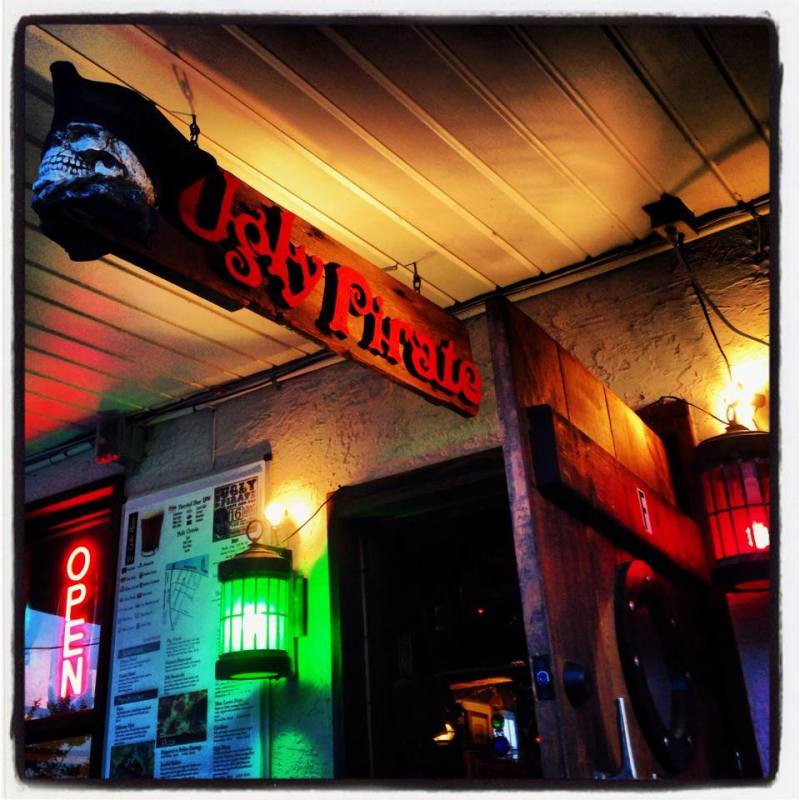Ugly Pirate entrance at night with neon lights