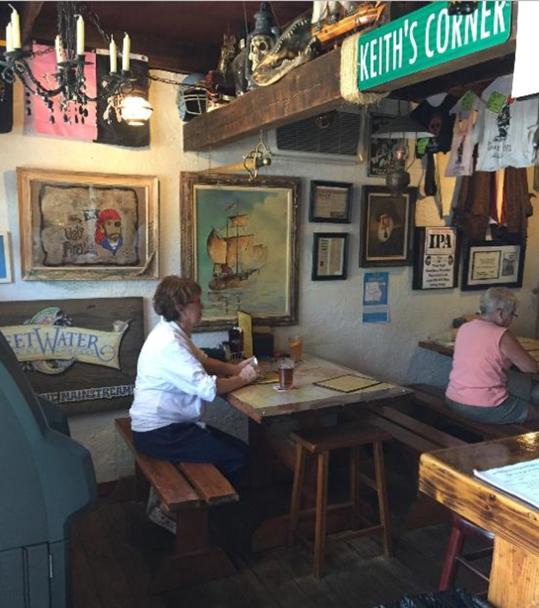 Interior dining with pirate art and Keith's Corner